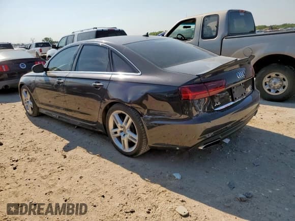 ✅ 2017 Audi A6 Premium • VIN: WAUF8AFC2HN063395 • Лот: 69587685. Опубликован ранее на Copart с пробегом 74 471 миль. Бесплатный доступ к архиву аукционных продаж из США и подробный отчёт об истории автомобиля на DreamBid. Изображение 2.