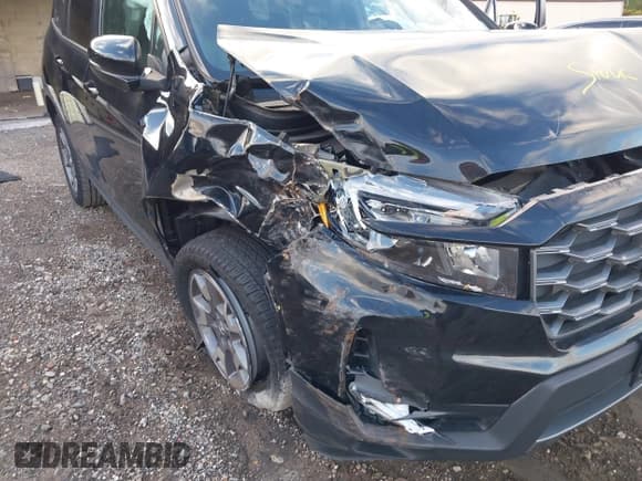 ✅ 2023 Honda Passport TrailSport • VIN: 5FNYF8H62PB040701 • Lot: 43494593. Listed on IAAI with 13,186 mi. Free auction sales archive from the USA and detailed vehicle history report at DreamBid. Image 6.