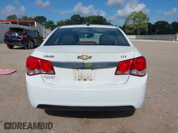 2014 Chevrolet Cruze LTZ with VIN 1G1PG5SB6E7302258, listed as a IAAI auction lot 42972181 with 134,584 mi miles and . Bid and sale history available at DreamBid. Image 16.