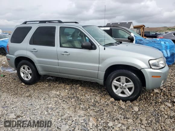 ✅ 2006 Mercury Mariner Hybrid • VIN: 4M2CU98H56KJ12607 • Lot: 51639875. Wystawiony na Copart z przebiegiem 136 352 mil. Bezpłatny archiwum sprzedaży aukcyjnych z USA i szczegółowy raport historii pojazdu na DreamBid. Zdjęcie 4.