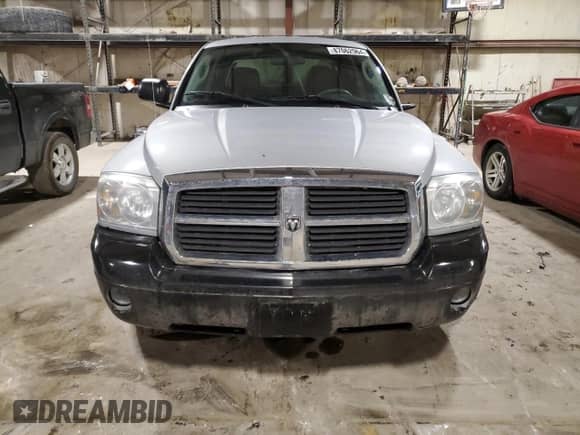 2007 Dodge Dakota SLT z VIN 1D7HW48K97S181294, wystawiony jako Copart lot #87062964 z przebiegiem 110 490 mil mil oraz Szkoda całkowita • Salvage title. Historia ofert i sprzedaży dostępna na DreamBid. Obrazek 5.