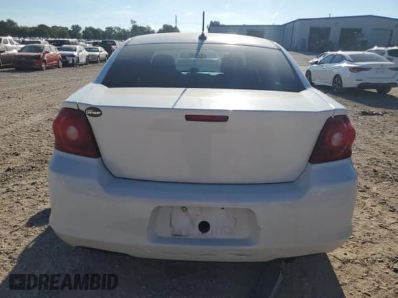 ✅ 2014 Dodge Avenger SE • VIN: 1C3CDZAB4EN168762 • Лот: 69445704. Опубликован ранее на Copart с пробегом 191 889 миль. Бесплатный доступ к архиву аукционных продаж из США и подробный отчёт об истории автомобиля на DreamBid. Изображение 6.