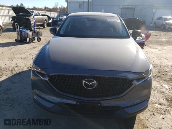 ✅ 2021 Mazda CX-5 Carbon Edition • VIN: JM3KFBCY3M0447651 • Лот: 91376115. Опубликован ранее на Copart с пробегом 22 165 миль. Бесплатный доступ к архиву аукционных продаж из США и подробный отчёт об истории автомобиля на DreamBid. Изображение 5.