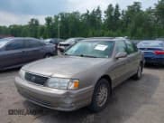 ✅ 1999 Toyota Avalon XL • VIN: 4T1BF18B2XU333348 • Лот: 42476873. Опубликован ранее на IAAI с пробегом 176 261 миль. Бесплатный доступ к архиву аукционных продаж из США и подробный отчёт об истории автомобиля на DreamBid. Изображение 2.