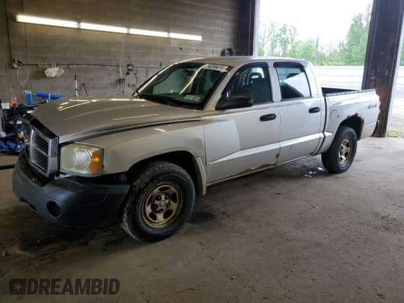 2007 Dodge Dakota ST z VIN 1D7HW28N37S144269, wystawiony jako Copart lot #56395474 z przebiegiem 101 210 mil mil oraz Nie do naprawy • Non repairable. Historia ofert i sprzedaży dostępna na DreamBid. Obrazek 1.