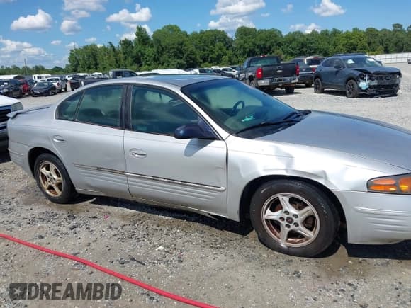 ✅ 2000 Pontiac Bonneville SE • VIN: 1G2HX54K3Y4282621 • Lot: 42584186. Wystawiony na IAAI z przebiegiem 264 418 mil. Bezpłatny archiwum sprzedaży aukcyjnych z USA i szczegółowy raport historii pojazdu na DreamBid. Zdjęcie 6.