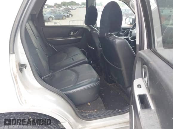 2006 Mercury Mariner Luxury with VIN 4M2YU57106KJ15112, listed as a IAAI auction lot 42815311 with 44,859 mi miles and . Bid and sale history available at DreamBid. Image 8.