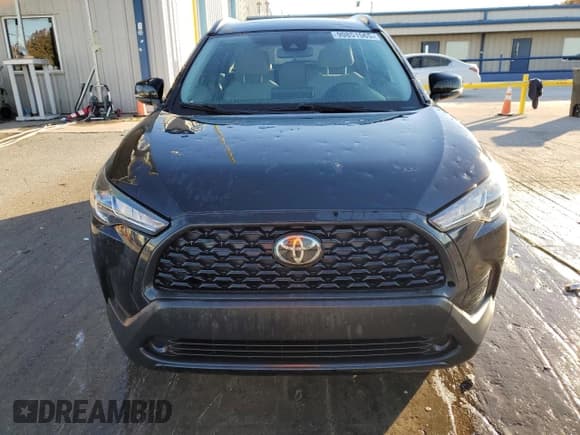 ✅ 2022 Toyota Corolla Cross LE • VIN: 7MUCAAAG5NV012215 • Lot: 90851565. Listed on Copart with 75,052 mi. Free auction sales archive from the USA and detailed vehicle history report at DreamBid. Image 5.