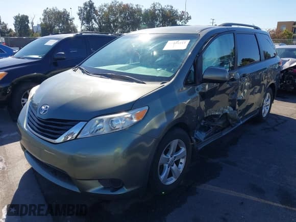 ✅ 2014 Toyota Sienna LE • VIN: 5TDKK3DC5ES458775 • Lot: 43588211. Listed on IAAI with 72,262 mi. Free auction sales archive from the USA and detailed vehicle history report at DreamBid. Image 2.