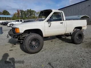 ✅ 1984 Toyota Pickup • VIN: JT4RN60R7E5003191 • Lot: 85524535. Listed on Copart with 207,495 mi. Free auction sales archive from the USA and detailed vehicle history report at DreamBid. Image 1.