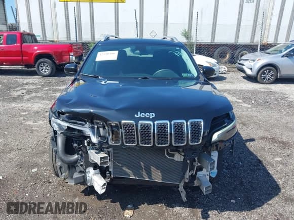 ✅ 2019 Jeep Cherokee Latitude • VIN: 1C4PJLCX6KD380768 • Lot: 42550106. Listed on IAAI with 61,507 mi. Free auction sales archive from the USA and detailed vehicle history report at DreamBid. Image 12.