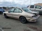 ✅ 1994 Pontiac Bonneville SE • VIN: 1G2HX52L8R4280540 • Lot: 52730244. Wystawiony na Copart z przebiegiem 164 728 mil. Bezpłatny archiwum sprzedaży aukcyjnych z USA i szczegółowy raport historii pojazdu na DreamBid. Zdjęcie 2.
