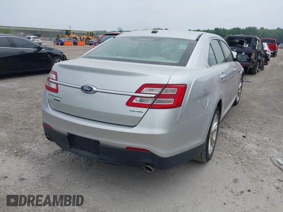 ✅ 2015 Ford Taurus SE • VIN: 1FAHP2D83FG149647 • Lot: 42686767. Listed on IAAI with 178,877 mi. Free auction sales archive from the USA and detailed vehicle history report at DreamBid. Image 4.
