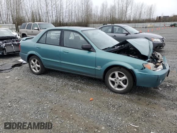 ✅ 2001 Mazda Protege LX • VIN: JM1BJ226510402231 • Lot: 46717595. Wystawiony na Copart z przebiegiem 154 138 mil. Bezpłatny archiwum sprzedaży aukcyjnych z USA i szczegółowy raport historii pojazdu na DreamBid. Zdjęcie 4.