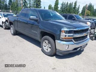 ✅ 2018 Chevrolet Silverado 1500 LT • VIN: 1GCUKREC4JF248673 • Лот: 42634215. Опубликован ранее на IAAI с пробегом 117 669 миль. Бесплатный доступ к архиву аукционных продаж из США и подробный отчёт об истории автомобиля на DreamBid. Изображение 1.