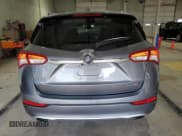 ✅ 2020 Buick Envision Premium • VIN: LRBFX3SX0LD137999 • Лот: 70746225. Опубликован ранее на Copart с пробегом 56 953 миль. Бесплатный доступ к архиву аукционных продаж из США и подробный отчёт об истории автомобиля на DreamBid. Изображение 6.