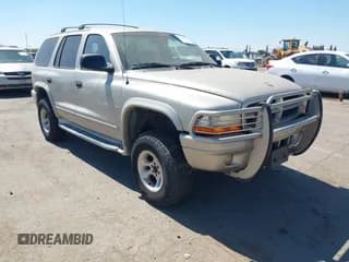 ✅ 2001 Dodge Durango • VIN: 1B4HS28N21F565015 • Lot: 42744735. Wystawiony na IAAI z przebiegiem 163 512 mil. Bezpłatny archiwum sprzedaży aukcyjnych z USA i szczegółowy raport historii pojazdu na DreamBid. Zdjęcie 1.