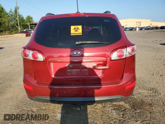 ✅ 2012 Hyundai Santa Fe GLS • VIN: 5XYZG4AG5CG112670 • Lot: 68135674. Listed on Copart with Not provided. Free auction sales archive from the USA and detailed vehicle history report at DreamBid. Image 6.