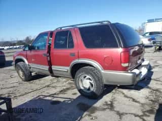2000 Chevrolet Blazer LT z VIN 1GNDT13W8Y2241861, wystawiony jako Copart lot #41696815 z przebiegiem 128 073 mil mil oraz Szkoda całkowita • Salvage title. Historia ofert i sprzedaży dostępna na DreamBid. Obrazek 2.