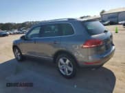 ✅ 2013 Volkswagen Touareg Exec • VIN: WVGEF9BP8DD010465 • Lot: 48802075. Listed on Copart with 149,491 mi. Free auction sales archive from the USA and detailed vehicle history report at DreamBid. Image 2.