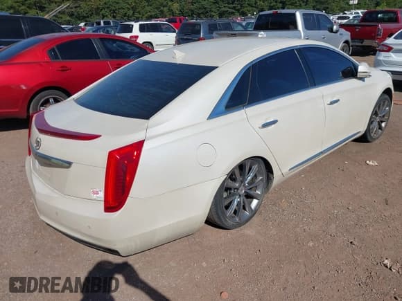 ✅ 2013 Cadillac XTS • VIN: 2G61N5S31D9147176 • Lot: 43066859. Wystawiony na IAAI z przebiegiem 144 805 mil. Bezpłatny archiwum sprzedaży aukcyjnych z USA i szczegółowy raport historii pojazdu na DreamBid. Zdjęcie 4.