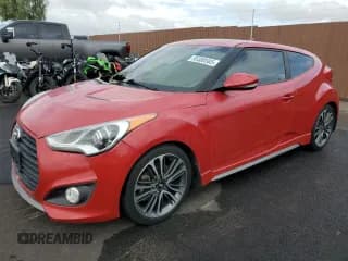 ✅ 2015 Hyundai Veloster Turbo • VIN: KMHTC6AE1FU235148 • Lot: 93308585. Listed on Copart with 78,023 mi. Free auction sales archive from the USA and detailed vehicle history report at DreamBid. Image 1.