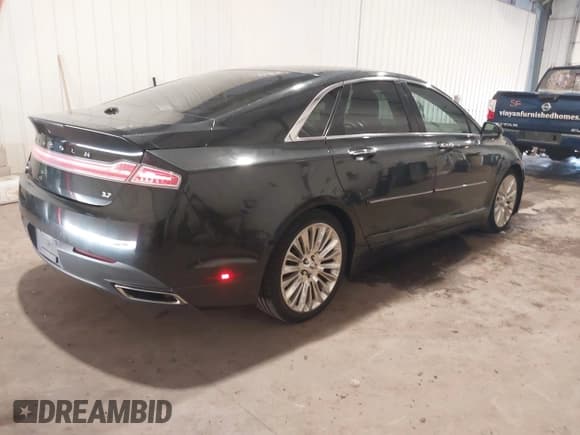✅ 2013 Lincoln MKZ • VIN: 3LN6L2GK8DR828657 • Lot: 42973773. Listed on IAAI with 108,102 mi. Free auction sales archive from the USA and detailed vehicle history report at DreamBid. Image 4.