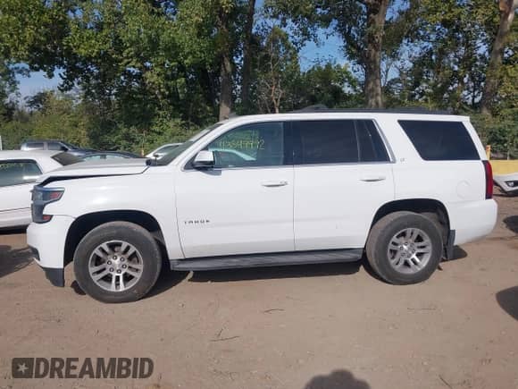 2015 Chevrolet Tahoe LT z VIN 1GNSKBKC3FR279459, wystawiony jako IAAI lot #43349972 z przebiegiem 112 043 mil mil oraz . Historia ofert i sprzedaży dostępna na DreamBid. Obrazek 14.