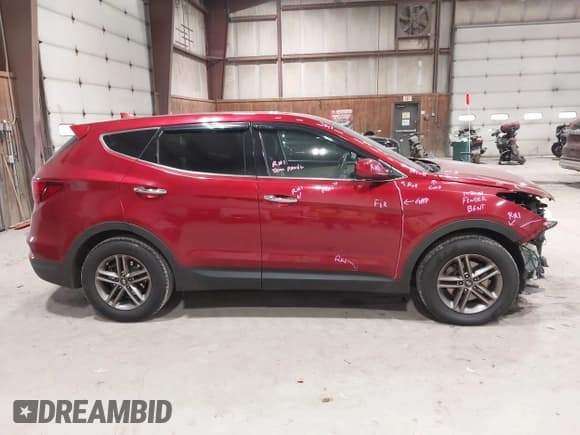 ✅ 2017 Hyundai Santa Fe 2.4L • VIN: 5XYZTDLB1HG413540 • Lot: 43900004. Listed on IAAI with 96,326 mi. Free auction sales archive from the USA and detailed vehicle history report at DreamBid. Image 13.