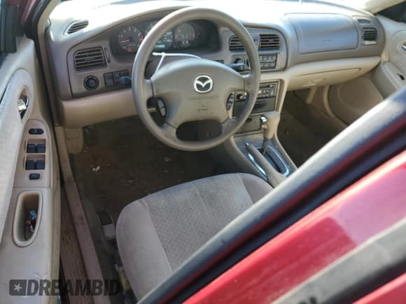 ✅ 2000 Mazda 626 LX • VIN: 1YVGF22CXY5172092 • Lot: 81960694. Wystawiony na Copart z przebiegiem 214 185 mil. Bezpłatny archiwum sprzedaży aukcyjnych z USA i szczegółowy raport historii pojazdu na DreamBid. Zdjęcie 8.