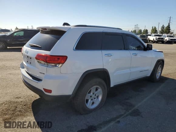 ✅ 2016 Jeep Grand Cherokee Limited • VIN: 1C4RJEBG8GC329226 • Lot: 86605525. Listed on Copart with 134,465 mi. Free auction sales archive from the USA and detailed vehicle history report at DreamBid. Image 3.