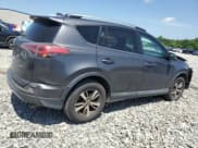 ✅ 2018 Toyota RAV4 XLE • VIN: 2T3WFREV2JW450330 • Lot: 57656175. Listed on Copart with 209,950 mi. Free auction sales archive from the USA and detailed vehicle history report at DreamBid. Image 3.