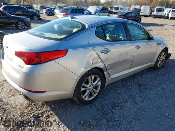 ✅ 2013 Kia Optima EX • VIN: 5XXGN4A7XDG101313 • Lot: 43528081. Listed on IAAI with 217,444 mi. Free auction sales archive from the USA and detailed vehicle history report at DreamBid. Image 4.