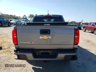 ✅ 2019 Chevrolet Colorado 4WD Work Truck • VIN: 1GCGTBENXK1353672 • Лот: 73746454. Опубликован ранее на Copart с пробегом 29 400 миль. Бесплатный доступ к архиву аукционных продаж из США и подробный отчёт об истории автомобиля на DreamBid. Изображение 6.