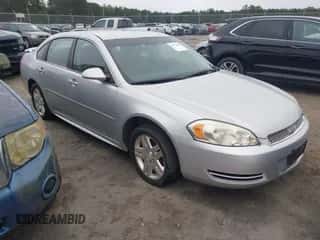 2013 Chevrolet Impala LT z VIN 2G1WG5E37D1232331, wystawiony jako IAAI lot #43570698 z przebiegiem 151 694 mil mil oraz . Historia ofert i sprzedaży dostępna na DreamBid. Obrazek 1.