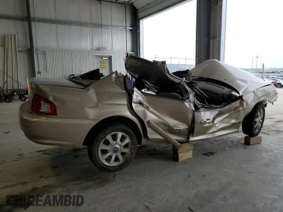 ✅ 2005 Kia Optima LX • VIN: KNAGD128455376493 • Lot: 51923155. Wystawiony na Copart z przebiegiem Nie podano. Bezpłatny archiwum sprzedaży aukcyjnych z USA i szczegółowy raport historii pojazdu na DreamBid. Zdjęcie 3.