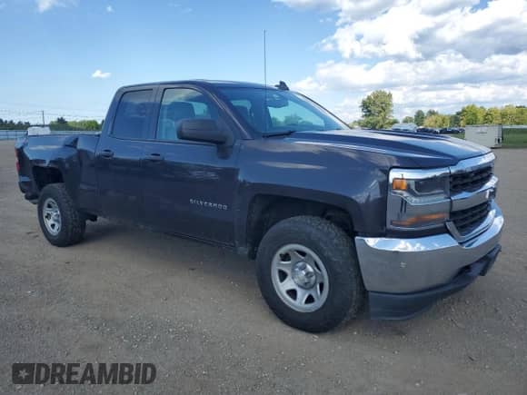 2016 Chevrolet Silverado 1500 Work Truck with VIN 1GCVKNEH1GZ171499, listed as a Copart auction lot 71405365 with 100,102 mi miles and Salvage title. Bid and sale history available at DreamBid. Image 4.