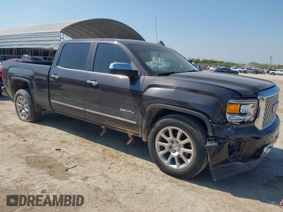 ✅ 2015 GMC Sierra 1500 Denali • VIN: 3GTU2WEJ3FG199436 • Lot: 43158752. Listed on IAAI with 109,949 mi. Free auction sales archive from the USA and detailed vehicle history report at DreamBid. Image 1.
