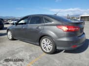 ✅ 2015 Ford Focus Titanium • VIN: 1FADP3J24FL387048 • Lot: 82431245. Listed on Copart with 124,984 mi. Free auction sales archive from the USA and detailed vehicle history report at DreamBid. Image 2.