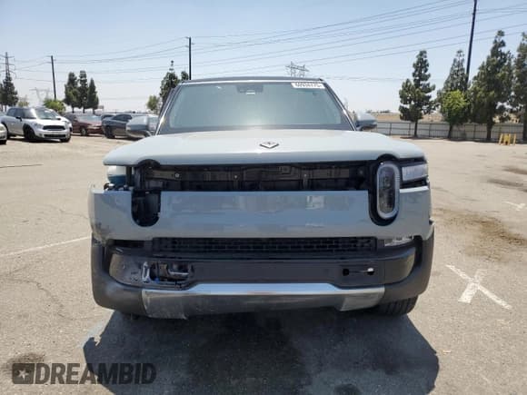 ✅ 2024 Rivian R1S Adventure • VIN: 7PDSGBBA3RN038417 • Лот: 60934775. Опубликован ранее на Copart с пробегом 22 772 миль. Бесплатный доступ к архиву аукционных продаж из США и подробный отчёт об истории автомобиля на DreamBid. Изображение 5.