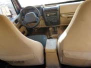 ✅ 2001 Jeep Wrangler Sahara • VIN: 1J4FA59S01P311648 • Lot: 89441105. Listed on Copart with 261,999 mi. Free auction sales archive from the USA and detailed vehicle history report at DreamBid. Image 8.