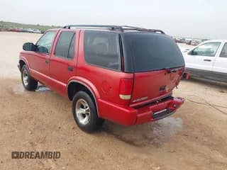 ✅ 2001 Chevrolet Blazer LT • VIN: 1GNCS13W112137572 • Lot: 42233556. Wystawiony na IAAI z przebiegiem 243 319 mil. Bezpłatny archiwum sprzedaży aukcyjnych z USA i szczegółowy raport historii pojazdu na DreamBid. Zdjęcie 3.