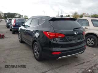 2016 Hyundai Santa Fe z VIN 5XYZUDLB2GG317413, wystawiony jako IAAI lot #43524563 z przebiegiem 167 905 mil mil oraz . Historia ofert i sprzedaży dostępna na DreamBid. Obrazek 3.
