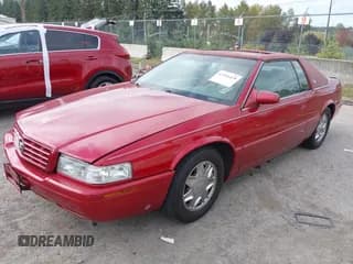 ✅ 2002 Cadillac Eldorado Touring • VIN: 1G6ET12942B102149 • Lot: 43316429. Wystawiony na IAAI z przebiegiem 126 614 mil. Bezpłatny archiwum sprzedaży aukcyjnych z USA i szczegółowy raport historii pojazdu na DreamBid. Zdjęcie 2.