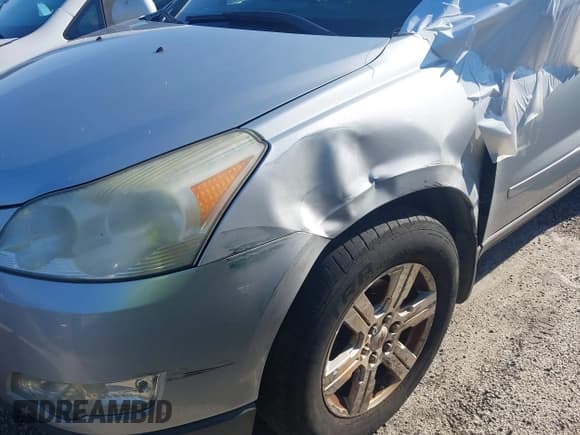 ✅ 2012 Chevrolet Traverse 2LT • VIN: 1GNKRJED8CJ277940 • Lot: 43601515. Listed on IAAI with 270,008 mi. Free auction sales archive from the USA and detailed vehicle history report at DreamBid. Image 6.