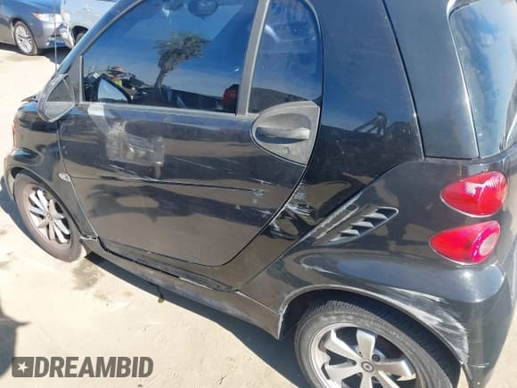 ✅ 2015 Smart fortwo Passion • VIN: WMEEJ3BA1FK804199 • Лот: 43852838. Опубликован ранее на IAAI с пробегом 115 448 миль. Бесплатный доступ к архиву аукционных продаж из США и подробный отчёт об истории автомобиля на DreamBid. Изображение 12.