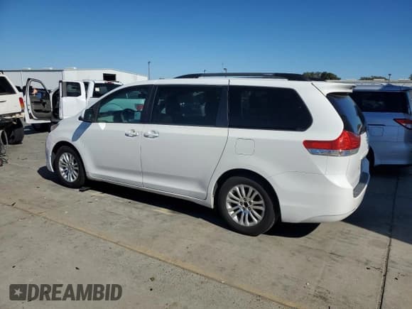 ✅ 2013 Toyota Sienna XLE AAS • VIN: 5TDYK3DC5DS370611 • Lot: 87197185. Wystawiony na Copart z przebiegiem 216 403 mil. Bezpłatny archiwum sprzedaży aukcyjnych z USA i szczegółowy raport historii pojazdu na DreamBid. Zdjęcie 2.