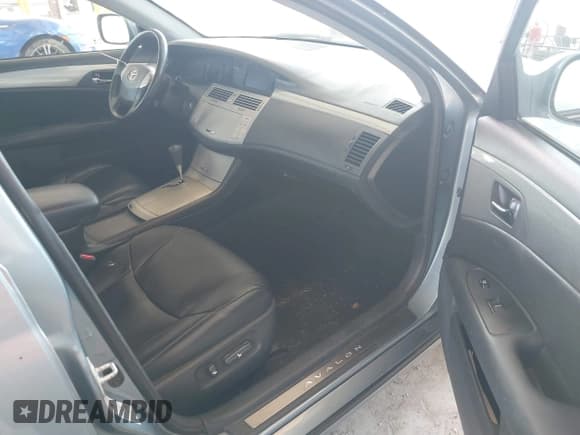 ✅ 2007 Toyota Avalon XL • VIN: 4T1BK36B17U197997 • Лот: 43111249. Опубликован ранее на IAAI с пробегом 303 478 миль. Бесплатный доступ к архиву аукционных продаж из США и подробный отчёт об истории автомобиля на DreamBid. Изображение 5.