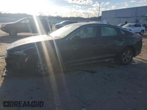 ✅ 2022 Kia K5 LXS • VIN: 5XXG14J20NG141725 • Лот: 82274605. Опубликован ранее на Copart с пробегом 62 410 миль. Бесплатный доступ к архиву аукционных продаж из США и подробный отчёт об истории автомобиля на DreamBid. Изображение 1.