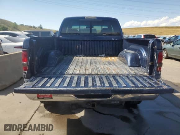 2001 Dodge 1500 с VIN 3B7HF13Z51G222581, выставлен на аукционе Copart как лот 71128324 с пробегом 174 495 миль миль и Списание • Salvage title. История ставок и продаж доступна на DreamBid. Изображение 6.